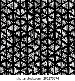 Hand drawn vector seamless triangles pattern with ink doodles.