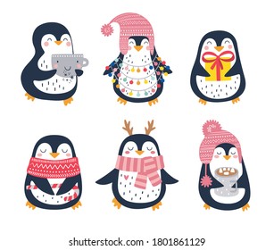 Hand drawn vector set of cute funny penguins. Trendy colored cartoon illustration. Christmas cute penguin characters
