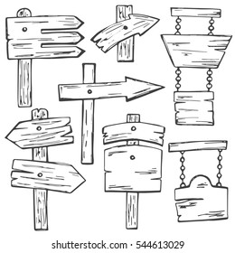 Hand drawn vector set of vintage wooden signpost. Pointer with place for text in doodle style. Doodle collection of icons for card design.