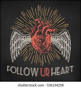 Hand drawn vector sketch illustration - creative vintage tee shirt apparel print poster design, flying human heart with sunburst and wings, black chalkboard background.