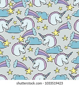 Hand Drawn Vector Unicorns, comets, stars, clouds. Magic creature.  Seamless pattern. For textile, wallpaper, covers, surface, print, gift wrap, scrapbooking, decoupage.