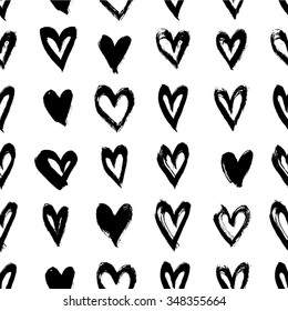 Hand drawn vector vintage texture. Seamless abstract pattern with hearts. Ink and feather