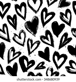 Hand drawn vector vintage texture. Seamless abstract pattern with hearts. Ink and feather