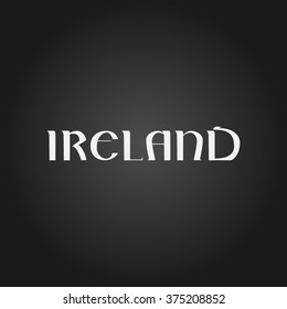 Hand drawn vector white  lettering "Ireland" on black background.