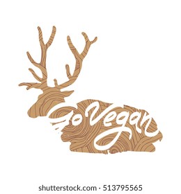 Hand drawn vintage antlers. "Go Vegan" quote with wood texture