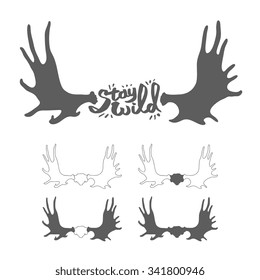 Hand drawn vintage antlers. "Stay wild" quote