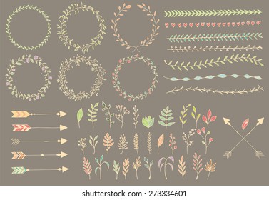 Hand drawn vintage arrows, feathers, dividers and floral elements, vector illustration