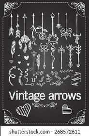Hand drawn vintage arrows on chalkboard.