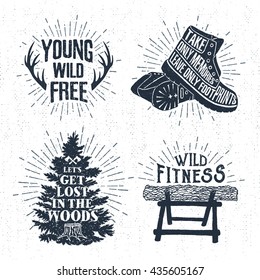 Hand drawn vintage badges set with textured horns, boots, fir tree, and log vector illustrations and inspirational lettering.