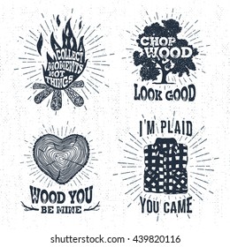 Hand drawn vintage badges set with textured bonfire, oak tree, tree trunk, and plaid shirt vector illustrations and inspirational lettering.