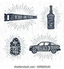 Hand drawn vintage badges set with textured saw, whiskey bottle, fir tree cone, and pickup truck vector illustrations and inspirational lettering.