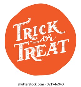 Hand drawn vintage halloween text with hand lettering and decoration. Trick or treat. This text can be used as a greeting card element or print.