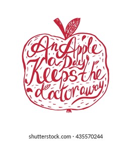 Hand drawn vintage motivational quote about health An apple a day keeps the doctor away . Can be used as a print, t-shirts, bags, greeting cards,poster etc.