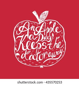 Hand drawn vintage motivational quote about health An apple a day keeps the doctor away . Can be used as a print, t-shirts, bags, greeting cards,poster etc.