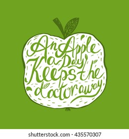 Hand drawn vintage motivational quote about health An apple a day keeps the doctor away . Can be used as a print, t-shirts, bags, greeting cards,poster etc.