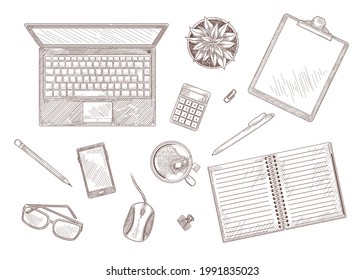 Hand drawn vintage sketch of desktop with laptop and stationary. Top view of computer, notebook, plant on table isolated on white background engraved illustrations set. Workplace, business concept