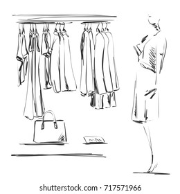 Hand drawn wardrobe sketch. Clothes on the hangers. Mannequin