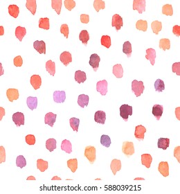Hand drawn watercolor background. Random colorful dots seamless pattern in red, pink and yellow colors.