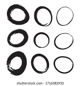 Hand drawn watercolor circle brush stroke set. Grunge chalk scribble ellipse and circle design elements for banner, insignia ,logo, Icon and badge. Brush circular freehand line smears.  Vector doodle.