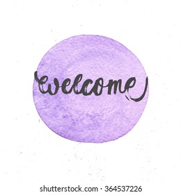 Hand drawn watercolor label, purple circle with brush lettering Welcome and grunge texture on backdrop