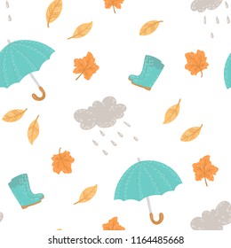 Hand drawn watercolor seamless pattern with autumn elements. Umbrella, leaf, rubber boots, cloud with rain drops.