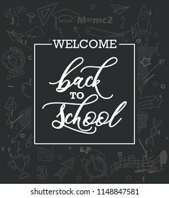 Hand drawn Welcome Back to school on a black background