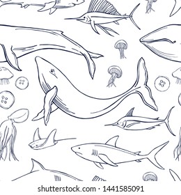 Hand drawn whales and fishes. Vector  seamless pattern.