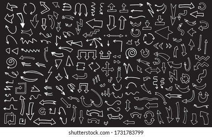 Hand drawn white arrows set isolated on black background. Modern sketch arrow collection handmade doodle style