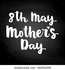 Hand drawn white chalk lettering "8th may Mother's Day" isolated on black chalkboard background. Vector calligraphy for your print and web products: greeting cards, banners, gift tags, advertising.