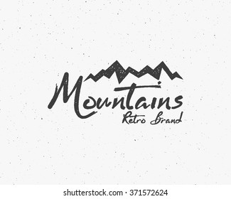 Hand drawn wilderness old style typography poster with retro mountains Letterpress Print Rubber Stamp Effect. Scratch background. Artwork for hipster wear. vector Inspirational vintage brand design
