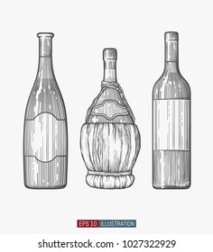Hand drawn wine bottles set. Engraved style vector illustration. Template for your design works.