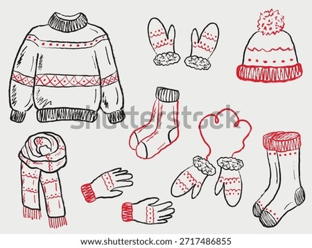 Hand drawn winter clothing set. Vector sketch illustration in vintage crayon charcoal style with red accents. Sweater, mittens, hat, socks, scarf, and gloves for cozy seasonal fashion. Christmas set