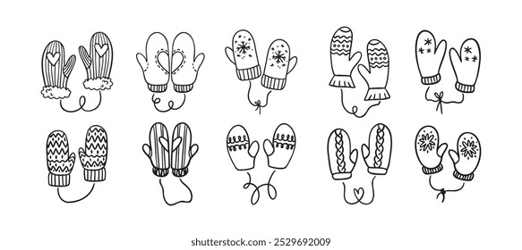 Hand drawn winter mittens. Doodle cute mittens elements black on white. Vector illustration.