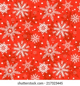 Hand drawn winter pattern with various falling snowflakes for Christmas background and holiday decor in bright red and white colors. Seamless vector texture.