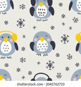 Hand drawn winter penguins with snowflakes seamless pattern. Perfect for T-shirt, textile and prints. Doodle style vector illustration for decor and design.