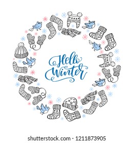 Hand drawn winter symbol in a circle with handwritten phrase Hello Winter inside. Print for T-shirt, poster, greeting cards. Vector illustration