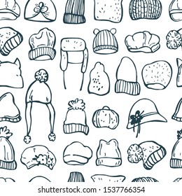 Hand drawn winter women's hats.  Vector seamless pattern.