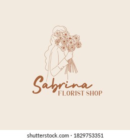 Hand drawn woman close the face and bring the flowers. Ink picture sign sketch in art doodle style. Perfect for logo or instagram highlight cover stories, logotype, invitation, label, greeting card