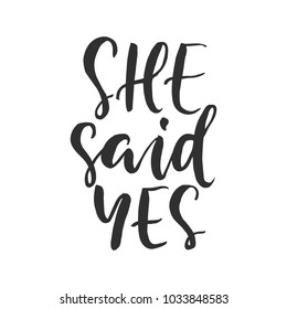 Hand drawn word. Brush pen lettering with phrase " she said yes "