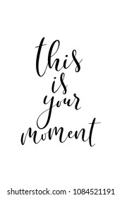 Hand drawn word. Brush pen lettering with phrase This is your moment.