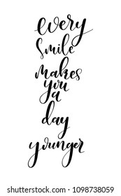 Hand drawn word. Brush pen lettering with phrase Every smile makes you a day younger.