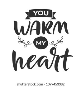 Hand drawn word. Brush pen lettering with phrase " you warm my heart "