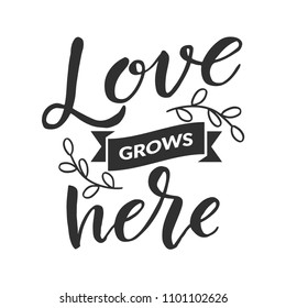 Hand drawn word. Brush pen lettering with phrase " love grows here "