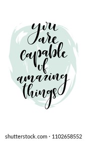 Hand drawn word. Brush pen lettering with phrase You are capble of amazing things.
