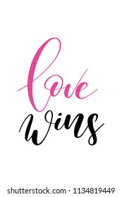 Hand drawn word. Brush pen lettering with phrase Love wins.