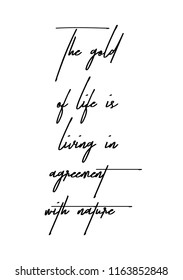 Hand drawn word. Brush pen lettering with phrase The gold of life is living in agreement with nature.