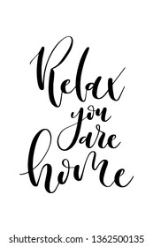 Hand drawn word. Brush pen lettering with phrase Relax you are home.