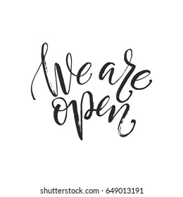 Hand drawn word. Brush pen lettering with phrase "we are open".