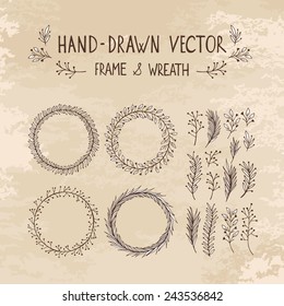 Hand drawn wreath and frame. Vector illustration