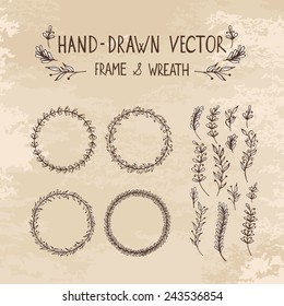 Hand drawn wreath and frame. Vector illustration